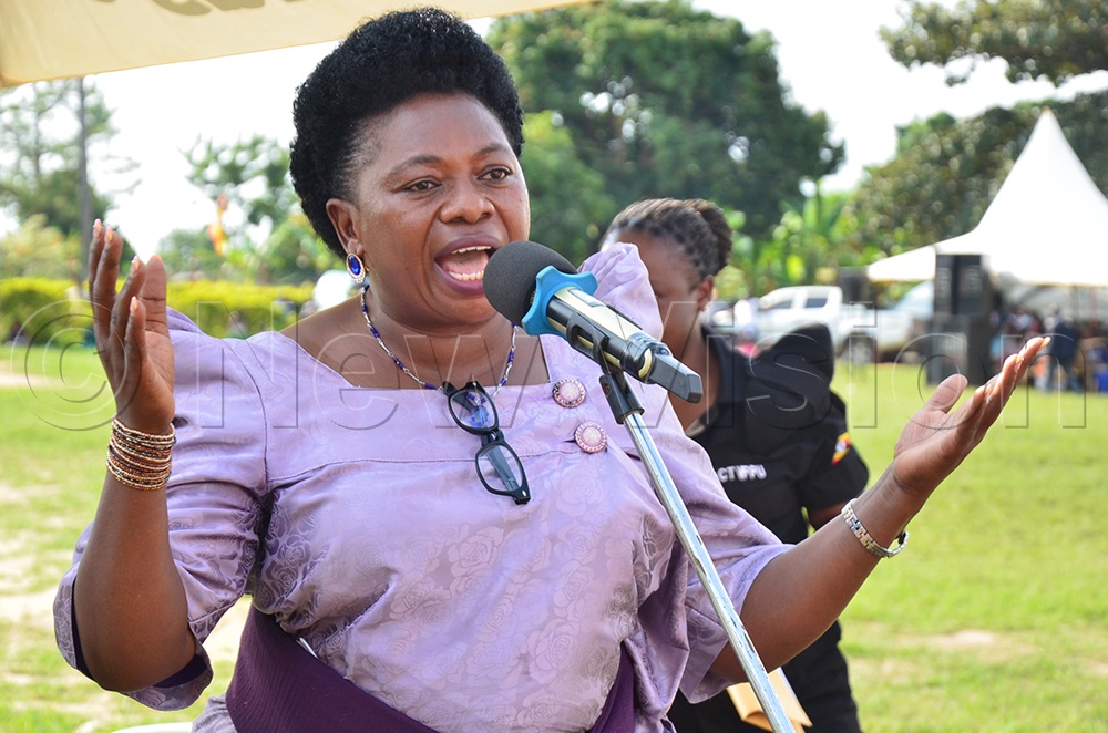 Harriet Ntabazi delivers the President's speech. (Photo by Jonan Tusingwire)