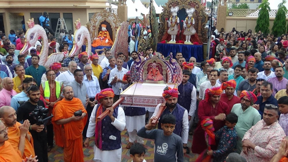 As part of the preparations for the consecration, devotees on Saturday afternoon participated in a Nagar Yatra, a religious procession through the streets of Gulu City carrying the deity&rsquo;s image. (Credit: Christopher Nyeko)