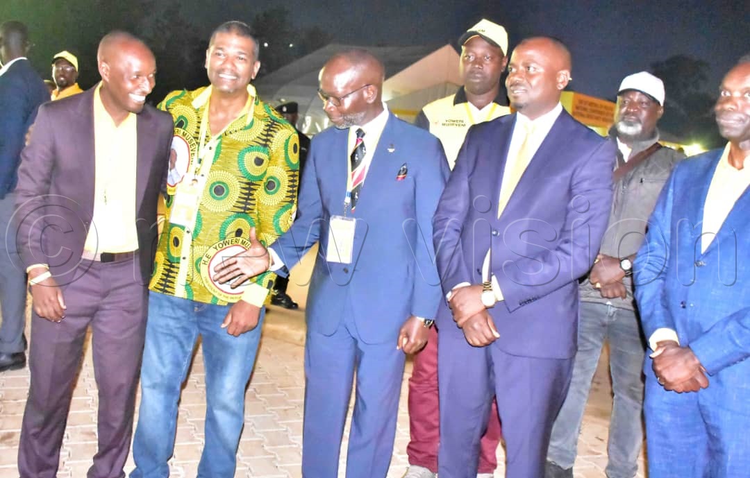 Government Chief Whip in Parliament, Denis Hamson Obua, jubilates with the other candidates that won the regional NRM vice-chairperson seats. (Photo by Joseph Mutebi)