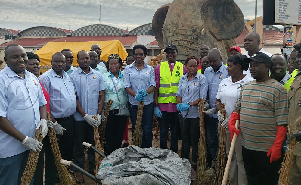 Deputy IGG, Dr Okiria with her regional staff, staff of Gulu City Council and the Bishop of the Diocese of Northern Uganda after the cleaning exercise. (Credit: Rosemary Anena)
