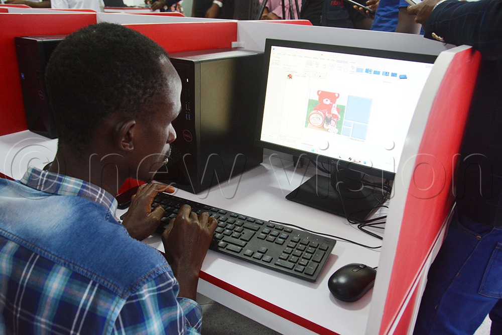 A resident of Luzira learning computer skills during the launch of digital community centre at Butabika Hospital in Kampala. (Photo by Francis Emorut)