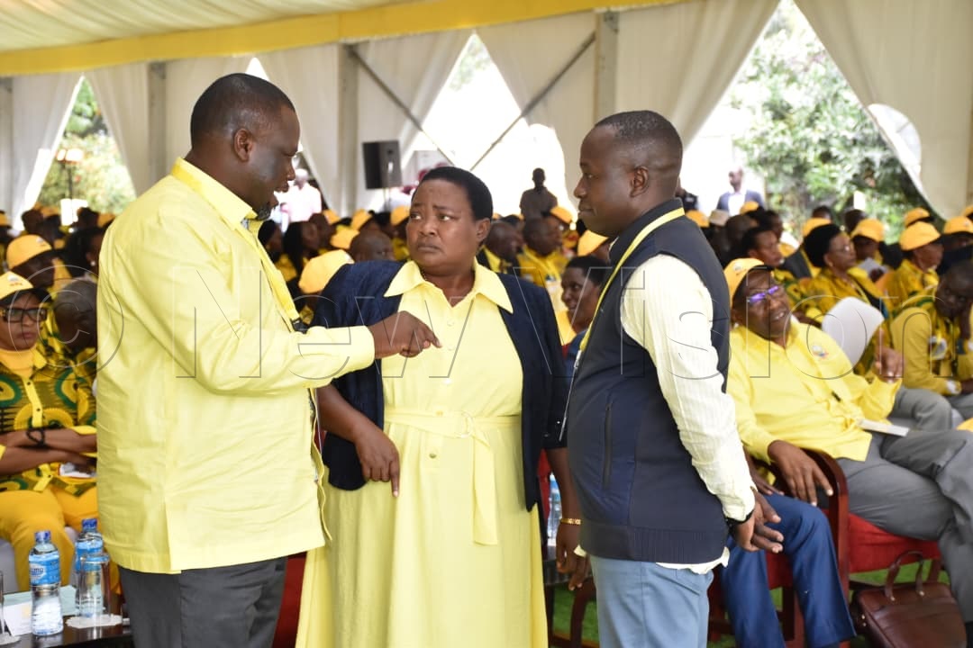 Todwong, Nabbanja and Ogwang interacting at the delegates conference.