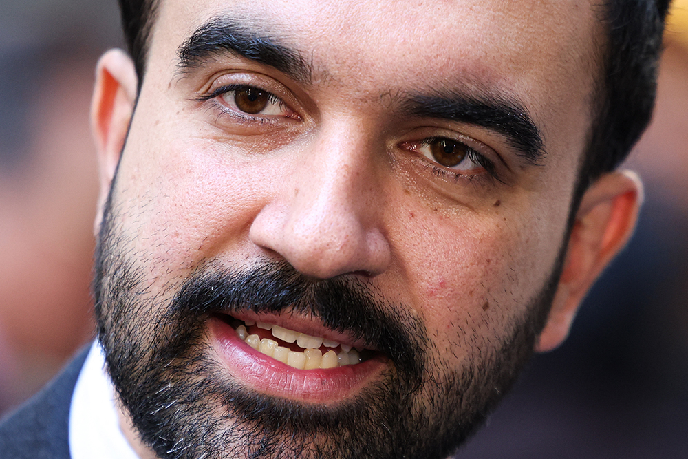 Democratic socialist candidate Zohran Mamdani speaks to the press in the Manhattan borough of New York during early voting for the upcoming mayoral election, on October 27, 2025. (Photo by CHARLY TRIBALLEAU / AFP)