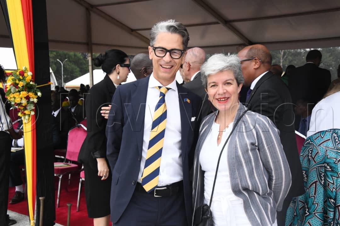 Ambassador Jan Sadek (left), Head of the EU Delegation to Uganda, posing for a photo with another diplomat.