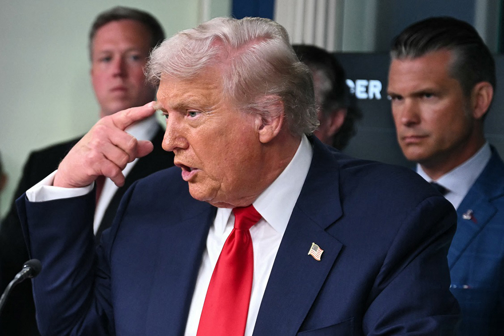 US President Donald Trump gestures while speaking during a news conference to discuss crime in Washington, DC, in the Brady Press Briefing Room at the White House in Washington, DC, on August 11, 2025. President Donald Trump announced Monday that he was deploying National Guard troops and putting the Washington police force under federal control to tackle crime in the US capital. "This is Liberation Day in DC, and we're going to take our capital back," Trump said at a White House press conference.