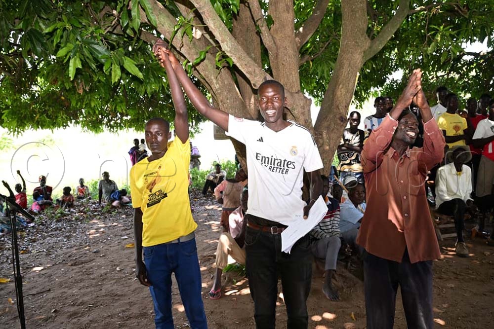 Residents congratulating Samuel Okameri, the newly elected LC1 Chairperson for Oigo-Imomwa Village in Ongongoja sub county Katakwi district. (Credit: Delux Emmy Alomu)