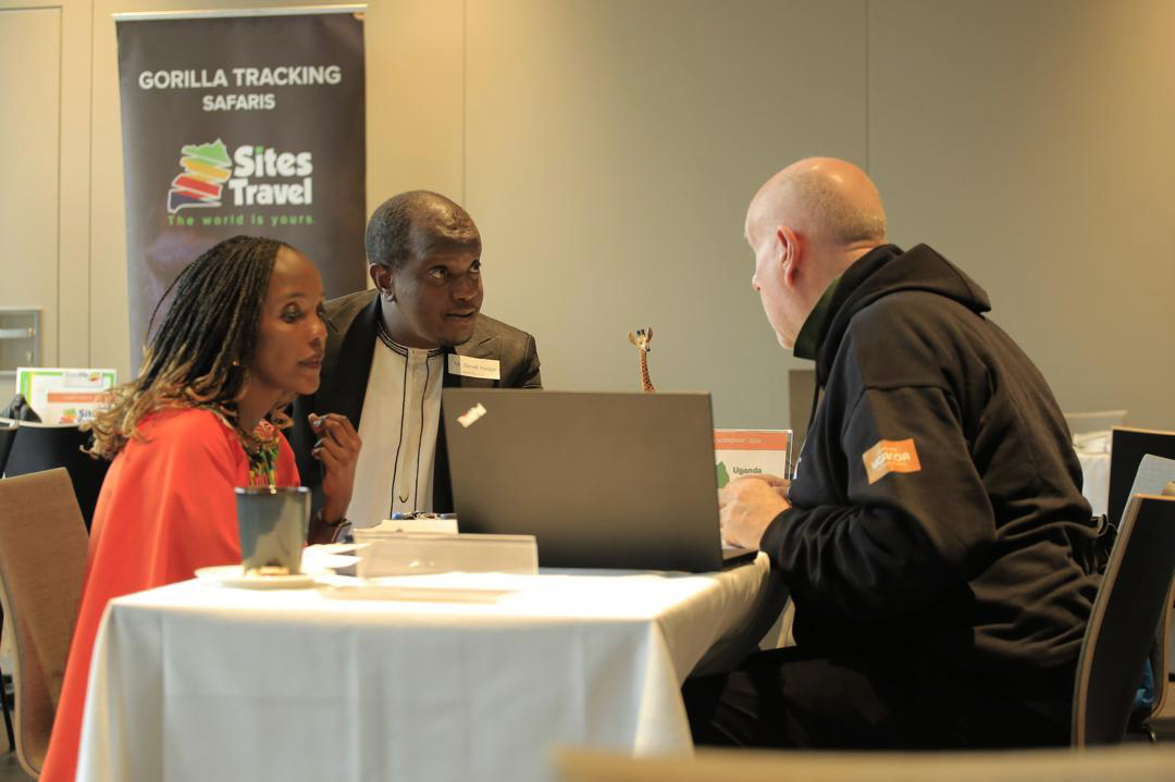  Jean Byamugisha (left) the CEO of Uganda Hotel Owners Association together with Daniel Irunga (centre) the UTB senior brand officer convincing one of the tour operators from the Nordic countries during the symposium that was organised in Denmark. (Courtesy photo)