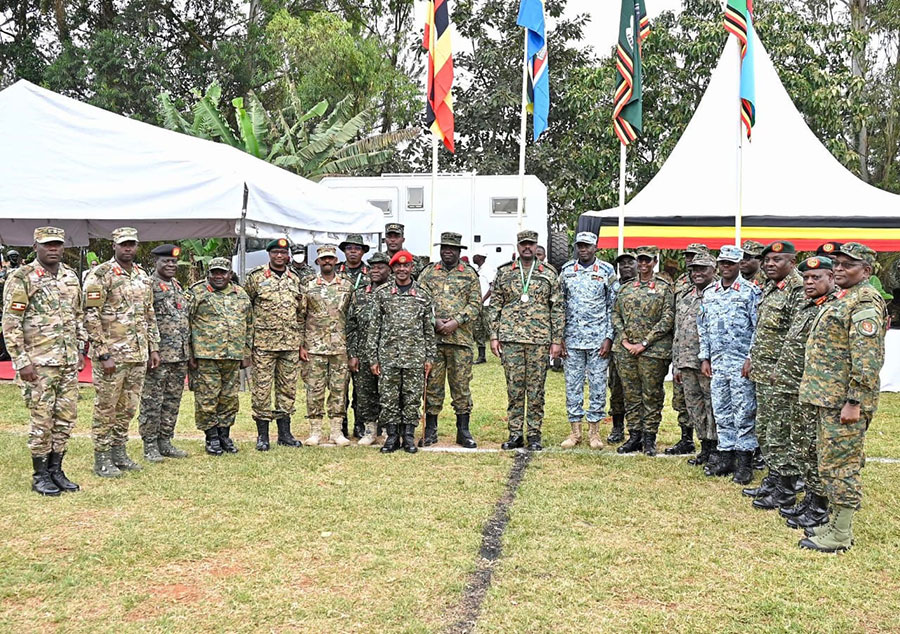 The Chief of Defence Forces General Muhoozi Kainerugaba (centre) poses with other high-ranking UPDF officers after the CDF Cup tournament in Masaka. Courtesy photo