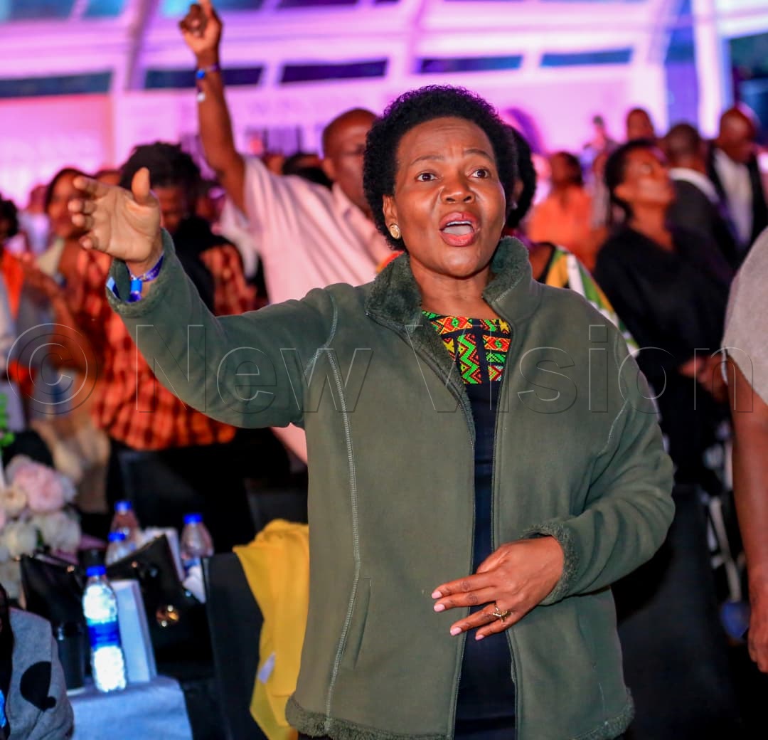 Irene Kauma, the undersecretary/senior private secretary to the First Lady and the Minister of Education and Sports, in a moment of worship.
