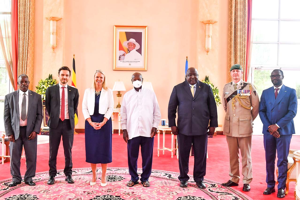 British High Commissioner To Uganda Lisa Chesney (c) And Her Delegation Pose For A Photo With President Museveni After Presenting Her Credentials At State House Entebbe On Thursday. (3rd R) Is Hon Okello Or