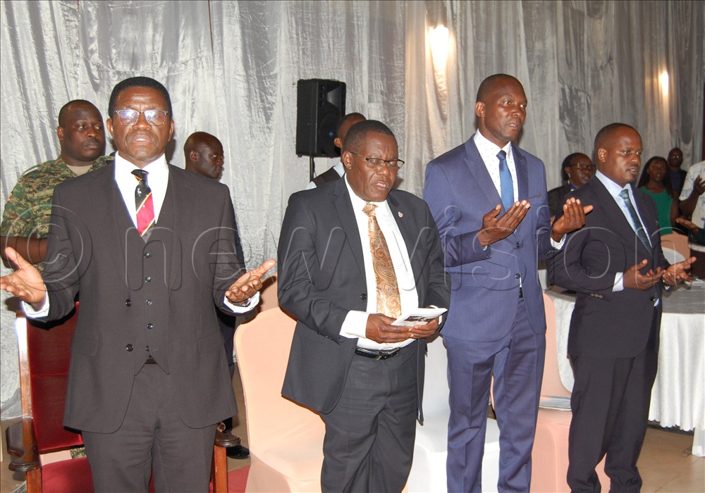 The Katikkiro of Buganda, Charles Peter Mayiga (left) with other Buganda Kingdom Officials during the memorial mass for the late Benedicto Kiwanuka at Pope Paul Memorial Hotel in Lubaga.  