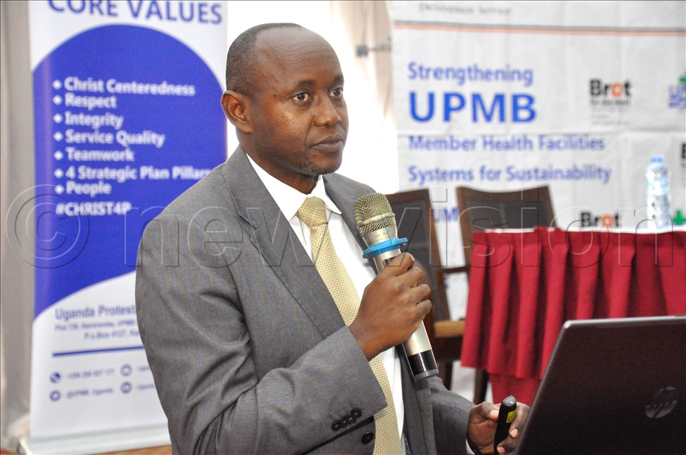  Tom Tumwesigye, the executive director of UPMB addressing participants during the Uganda Protestant Medical Bureau annual symposium at Imperial Royale Hotel on December 5, 2024. 
