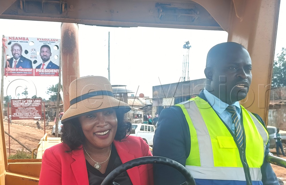Kassanda RDC Phoebe Namulindwa (left) and District Chairperson Drake Ssembusi (right) during the launch of road construction works in the district. (Photo by Luke Kagiri)
