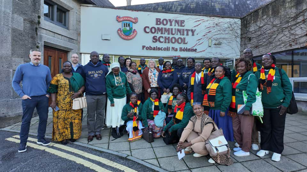 Teachers Making a difference pose for a photo with staff of Boyne Community School after their visit. 