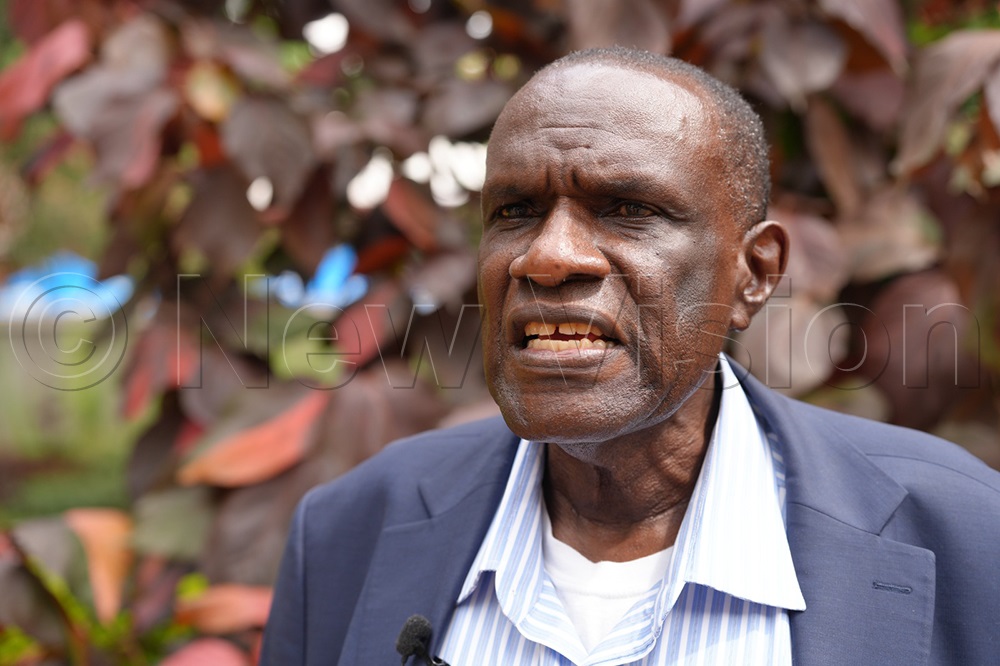 Secretary in the Office of the President, Yunus Kakande, assures Sironko farmers of President Museveni’s support for the factory project. (Photo By Javier Silas Omagor)