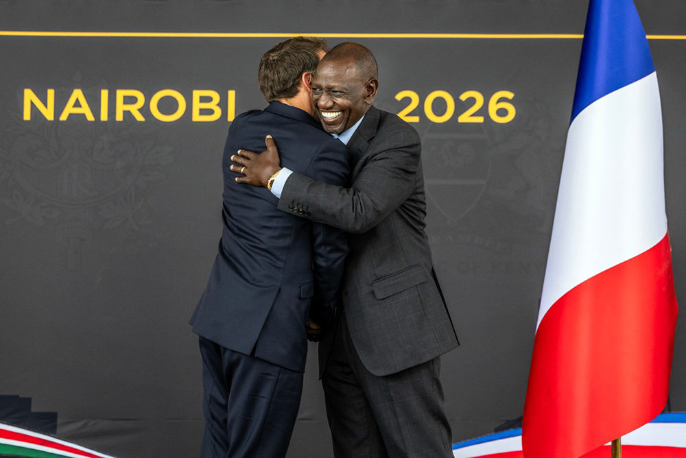 French President Emmanuel Macron (L) and Kenyan President William Ruto (R) react as they shake hands during a reception at State House ahead of the Africa Forward: Africa- France Partnerships for Innovation and Growth Summit in Nairobi, on May 10, 2026. 