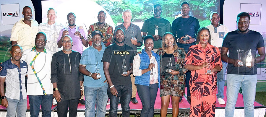 The different winners and sponsors' representatives pose with their trophies after the MUEMA Golf Challenge at the Lake Victoria Serena Golf Resort. Photo by Michael Nsubuga