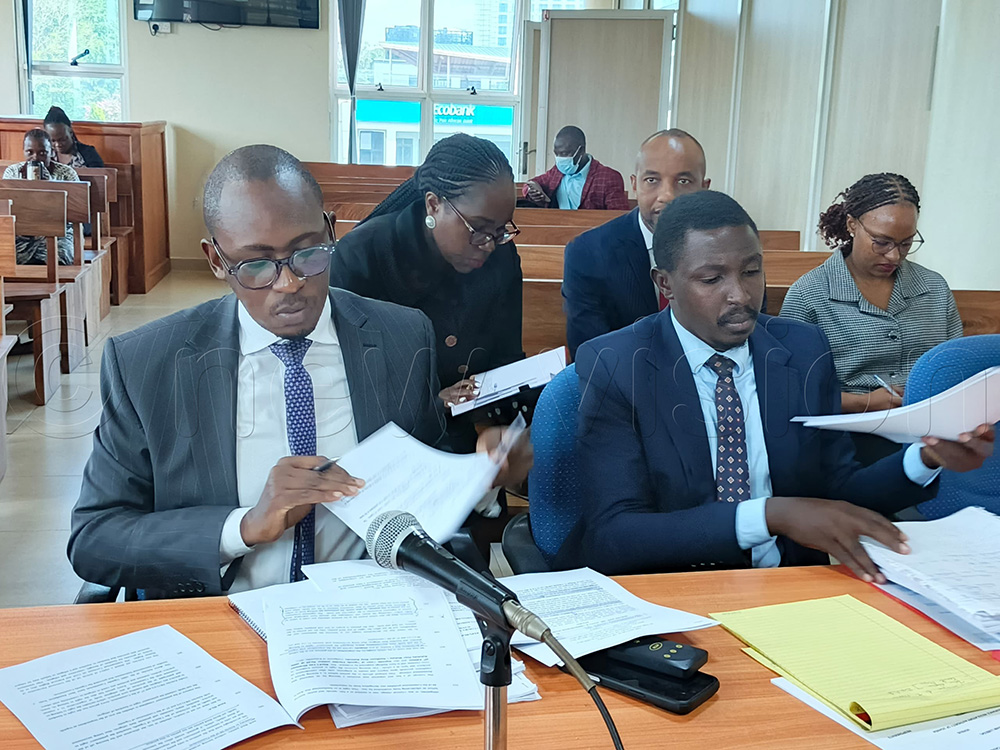 IRA lawyers John Musiime and Kenneth Mugira at the Civil Division of the High Court in Kampala on Monday June 1, 2026. (Photo by Farooq Kasule)