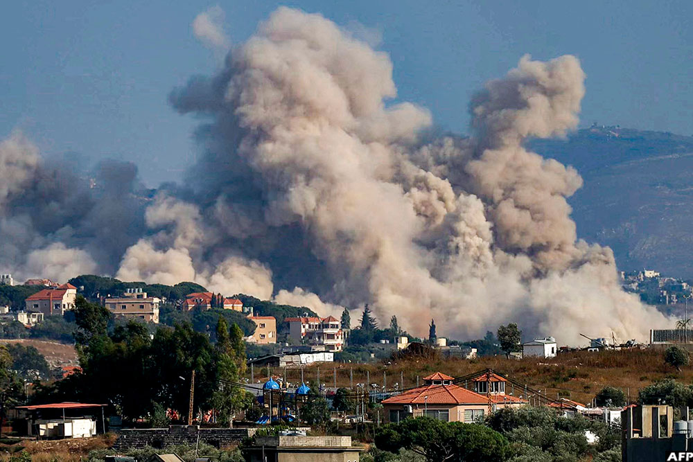Smoke rises following an Israeli controlled-explosion on the village of Kfartibnit as seen from Nabatieh in southern Lebanon on July 29, 2026