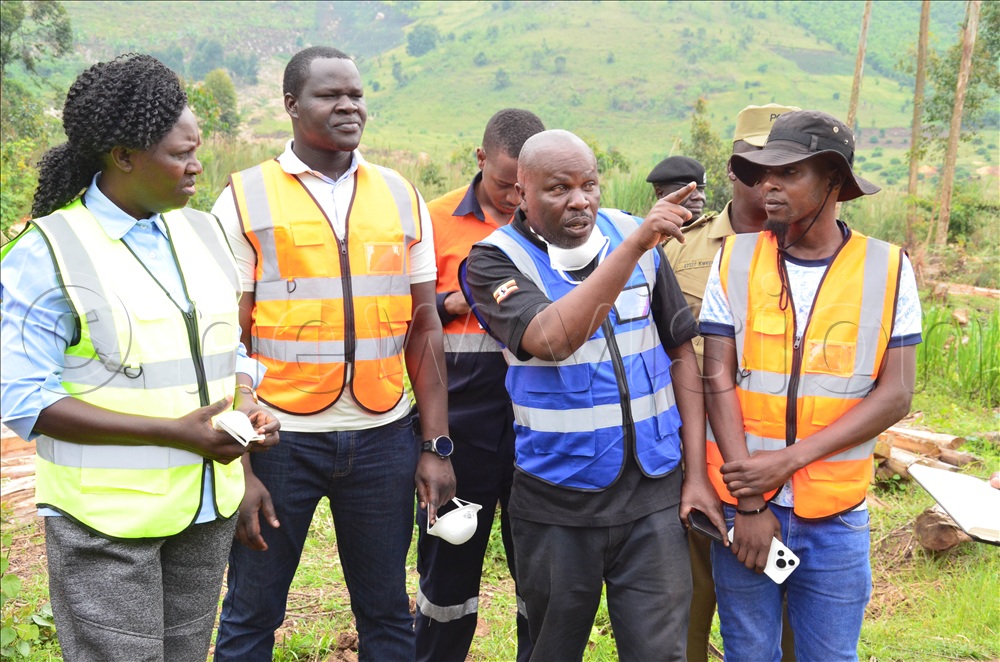 Agnes Alaba, the commissioner responsible for the mines department in the ministry of Energy and Mineral Development (left) and her team visited mining sites in Buhweju district on Saturday