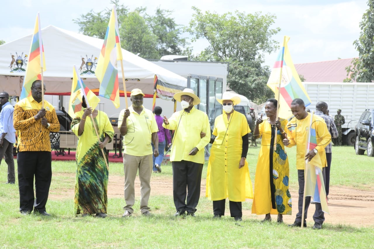 President Yoweri Museveni and First Lady Janet Museveni pose for a photo with NRM party flag bearers.