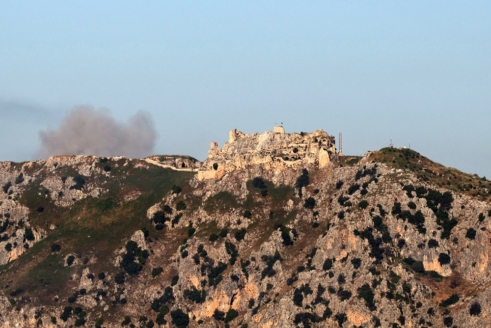 An Israeli flag flies over the medieval Beaufort Castle, known locally as Qalaat al-Shaqif or Shaqif Arnoun, as seen from the Marjayoun area of southern Lebanon on May 31, 2026.