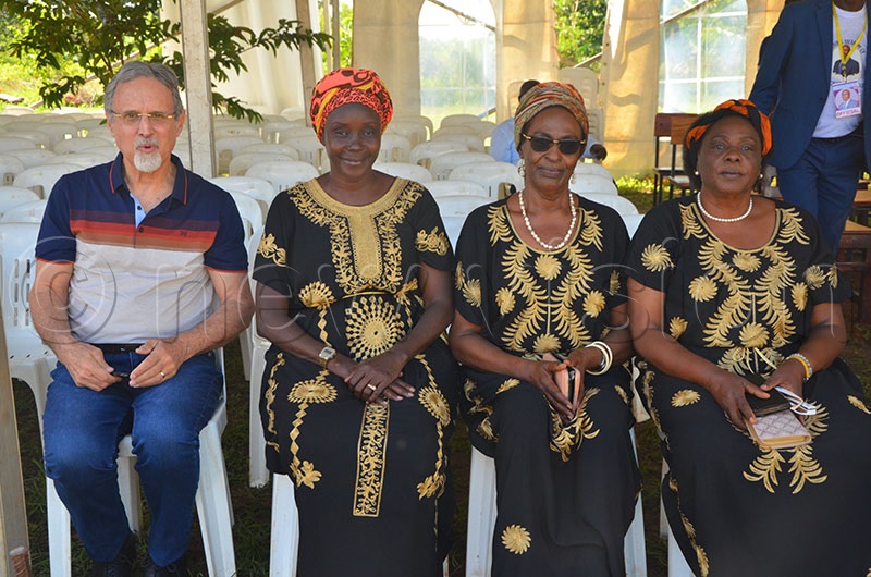 Mary Karoro Okurut with her sister, daughter and son-in-law during the burial of Onapito Ekomoloit in Amuria district. (Photo by Godfrey Ojore)