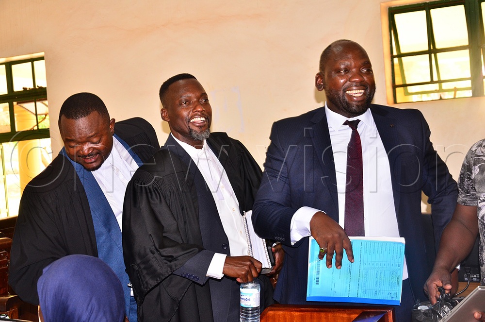 Batuwa (front), Galisonga (centre) and Mudiobole emerge from the courtroom after the hearing of the petition at the High Court in Jinja on Wednesday, Sept. 30, 2026. (Photo by Jackie Nambogga)