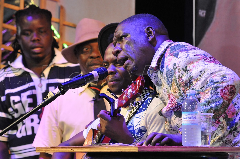 Dick Zizinga (right) performs alongside Blaik Koono during the Arise We Men comedy show. (Credit: Nicholas Oneal)
