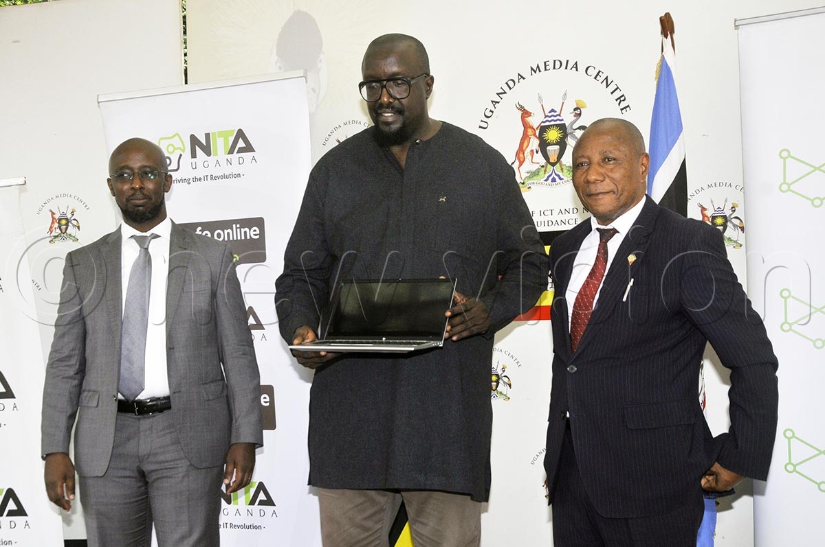 (L-R) NITA-U executive director Dr Hatwib Mugasa, Uganda Media Centre executive director Allan Kasujja, and minister Godfrey Kabbyanga during the briefing. Photo by Wilfred Sanya