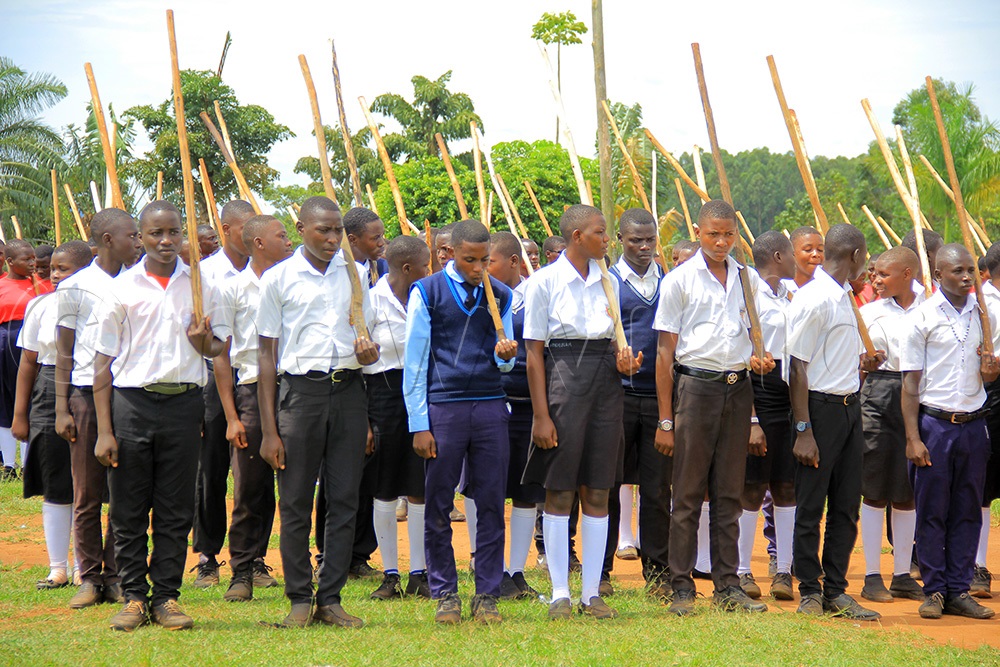 285 students from five secondary schools in Kyenjojo District graduated as patriots on Friday, April 17, 2026, . (Photo by Daniel Beingana)