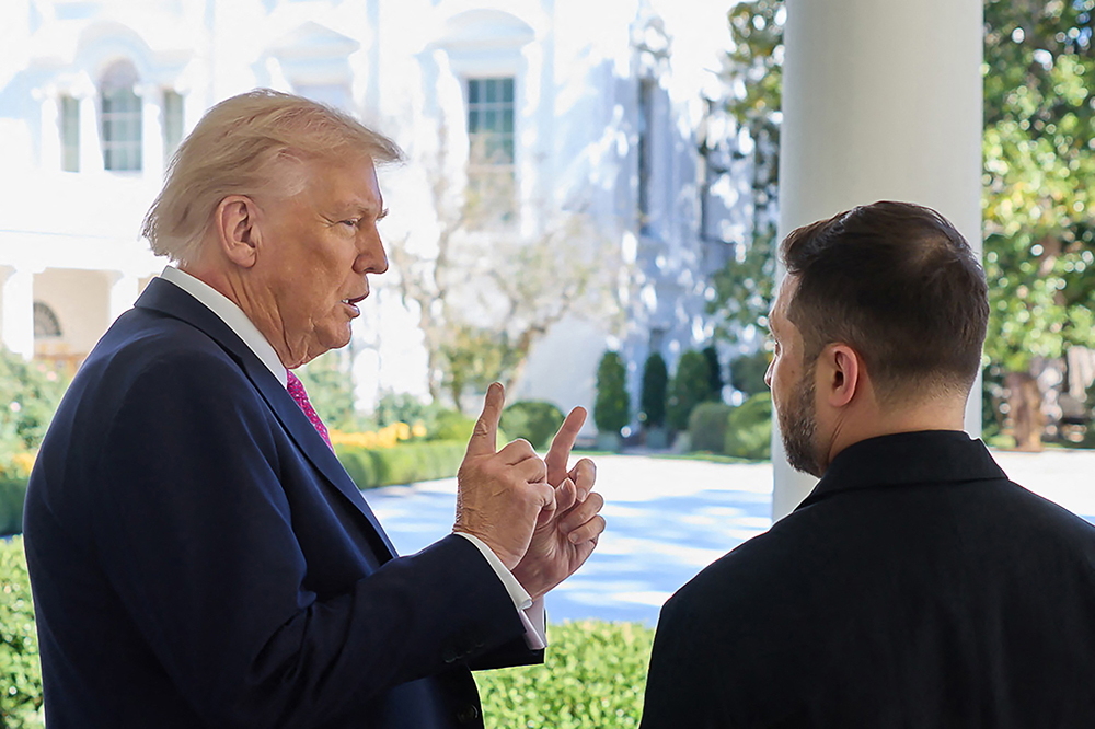 Ukrainian presidential Press Service, US President Donald Trump (L) speaks with Ukraine's President Volodymyr Zelensky (R) at the White House in Washington, DC. (AFP)