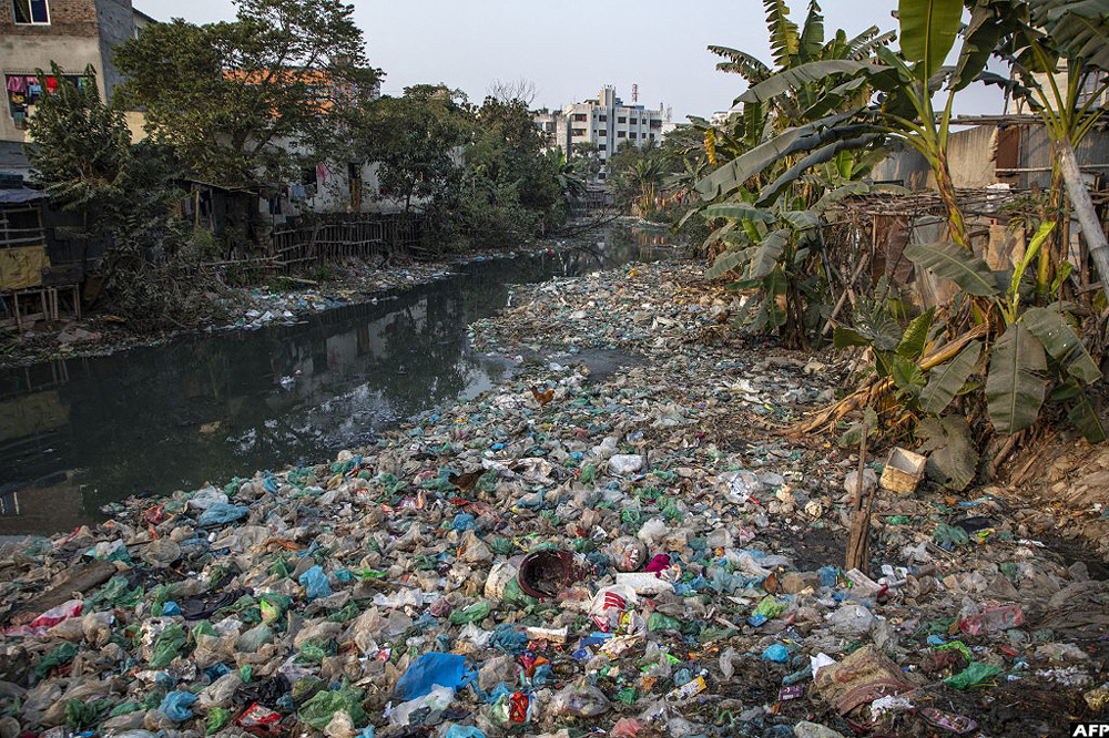 A canal is choked with plastic waste in Dhaka, Bangladesh, on February 5, 2024