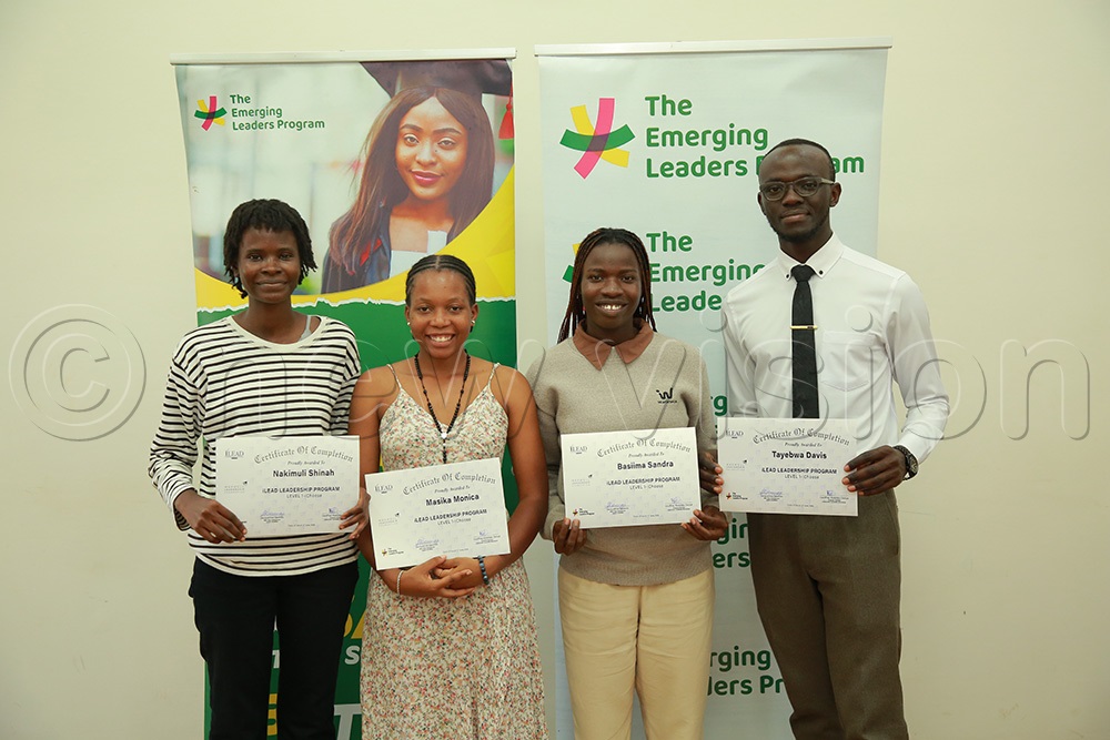 Some graduates of SAFE&ndash;iLead John Maxwell Leadership Programme pose with their certificates at Makerere University. (Photo by Nelson Kiva)