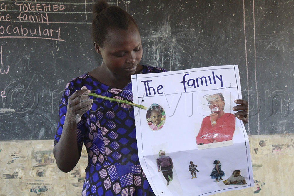 Cherotin uses pictures to show children what the family members look like.