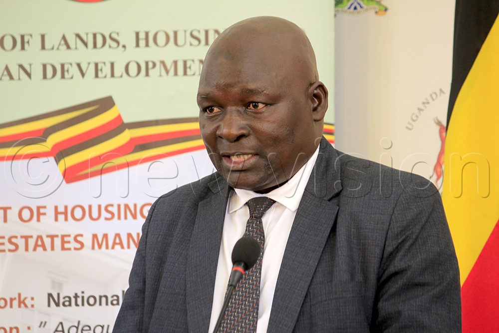 Dave Khayangayanga, the Director of Housing in Ministry of Lands, Housing and Urban Development, speaking during the press conference held on September 18. (Photo by Alfred Ochwo)