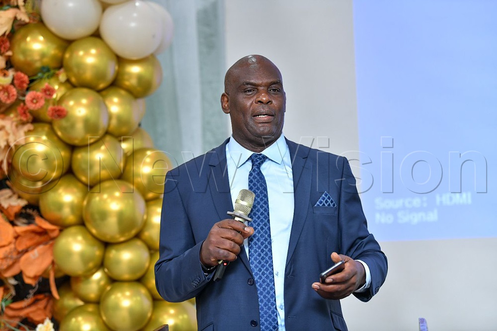 Justice Mike Chibita addresses guests at the launch.