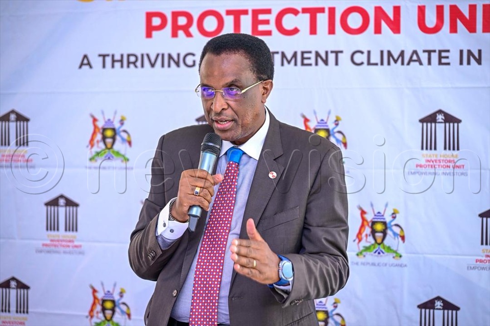 Winstone Katushabe, the Commissioner for Transport Regulation and Safety at the Ministry of Works and Transport speaking during the meeting.