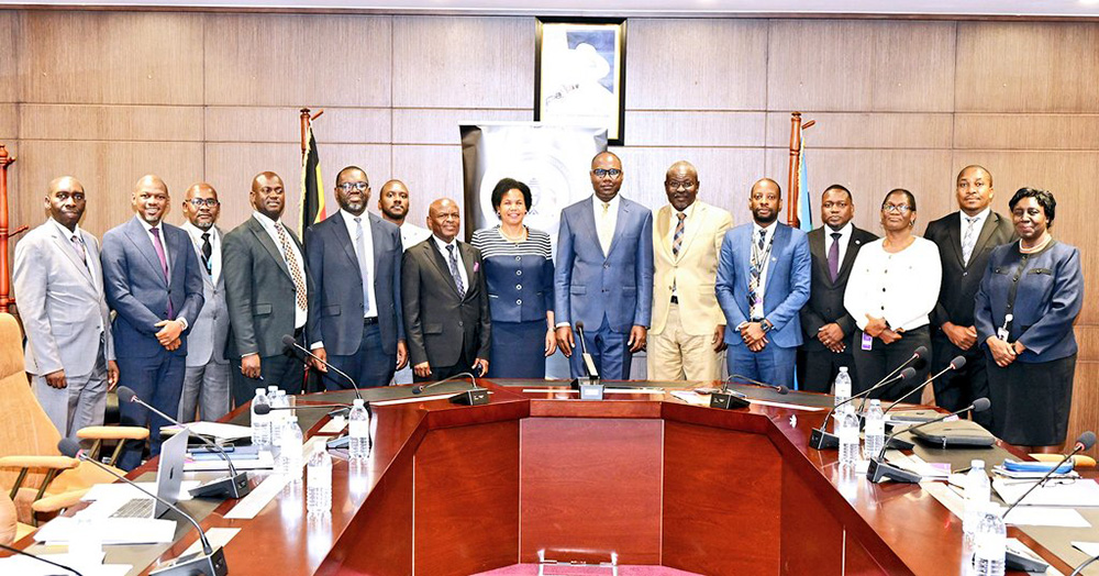 Finance officials and the Deposit Protection Fund (DPF) team pose for a photo moment after the meeting. (Courtesy photo)