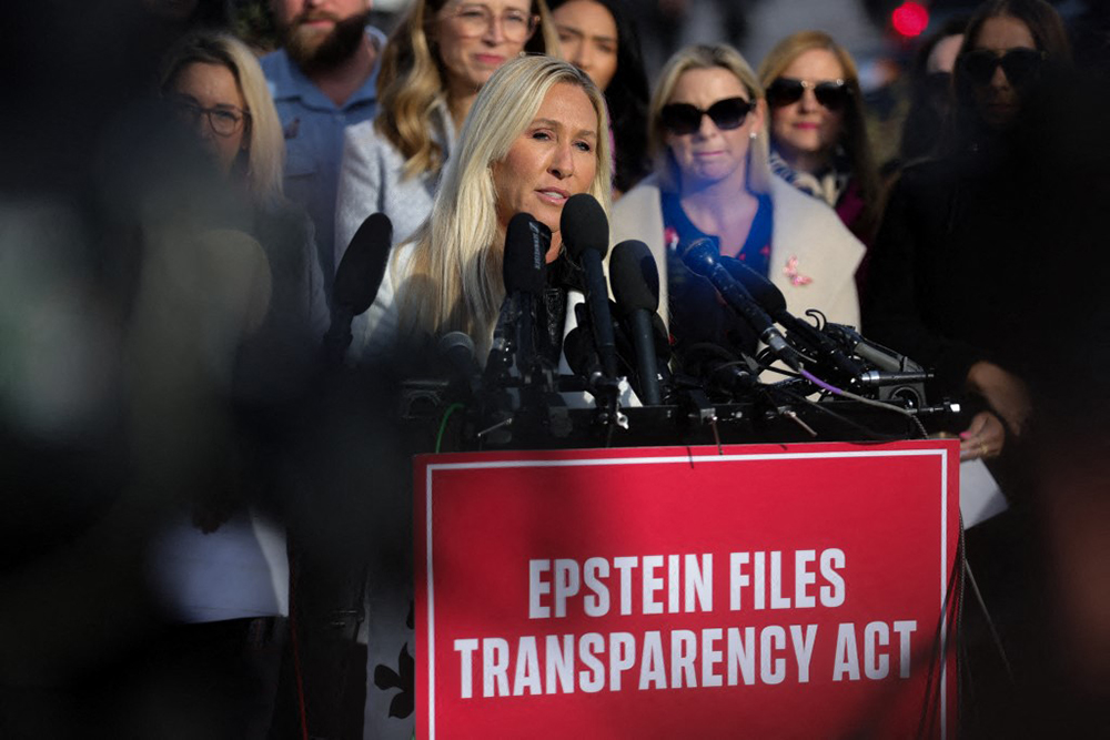 US Representative Marjorie Taylor Greene (R-GA) speaks at a press conference alongside alleged victims of Jeffrey Epstein at the US Capitol in Washington, DC on November 18, 2025, discussing the Epstein Files Transparency Act, which calls for the release of all unclassified documents in the Jeffrey Epstein case. (AFP)
