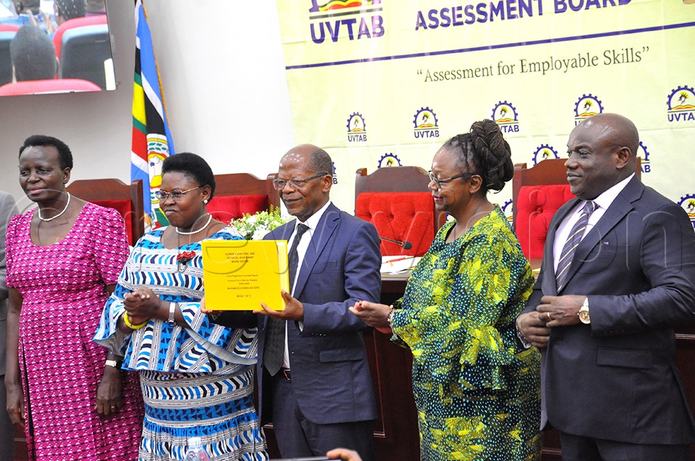 (L-R) Kedrace Turyagyenda Permanent Secretary Ministry of Education, Joyce Moriku Kaducu State Minister for Primary Education, Chrysostom Muyingo Minister of State for higher education, Dorothy Okello Board Chairperson UVTAB and Onesmus Oyesigye the Executive Secretary of the Uganda Vocational and Technical Assessment Board (UVTAB) during the release of assessment results at Uganda Vocational and Technical Assessment Board (UVTAB) on April 1, 2026. (Photo by Nancy Nanyonga)