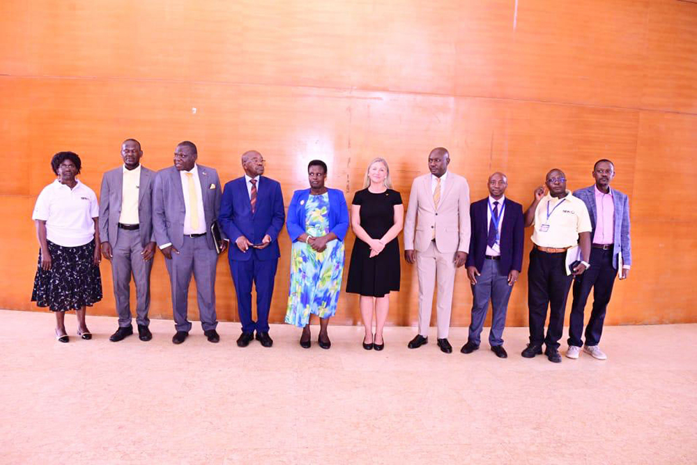 Vice President Jessica Alupo poses for a group photo with officials from UNFPA and the National Planning Authority after the virtual press briefing. (Courtesy)