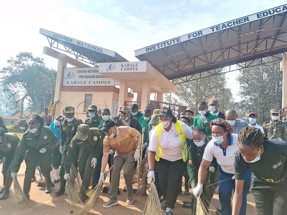 Professor Augustus Nuwagaba participates in a cleaning exercise. (Credit: Nelson Ahimbisibwe)