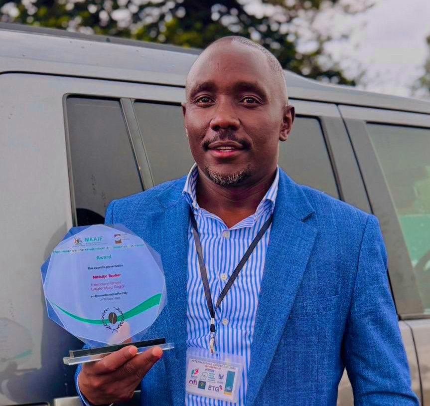 Topher Matsiko, a farmer from Gomba district showing off his award. (Courtesy photo)