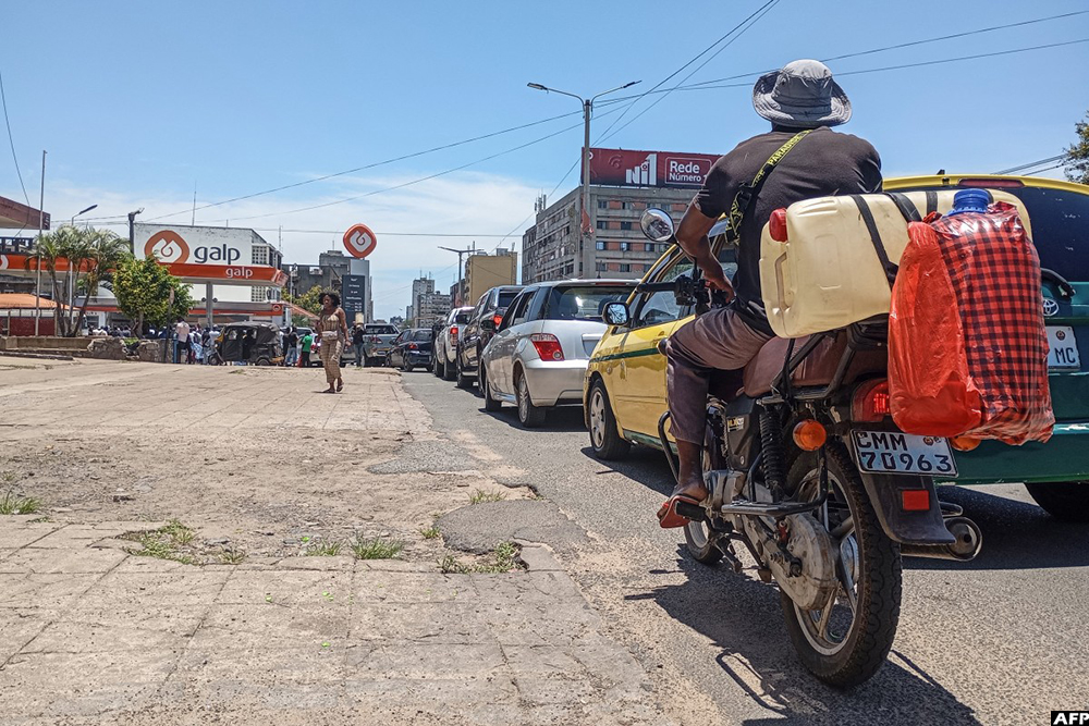 Motorists join long queues at a gas station in Maputo on December 27, 2024