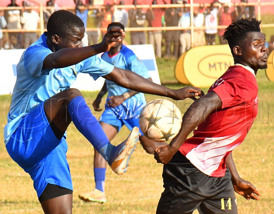 Kigulu FC (in blue jerseys) playing against Luuka FC (in maroon jerseys) during the final of the MTN-Busoga Masaza Cup at the Kyabazinga Stadium in Bugembe. Photo by Donald Kiirya