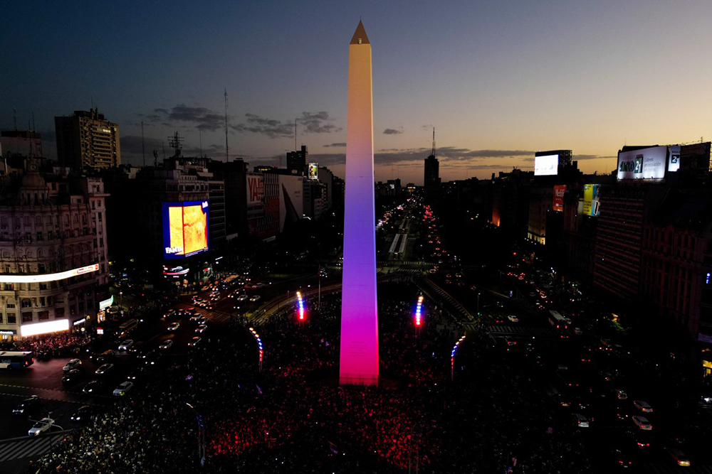 This aerial view shows the Obelisk lit in the colors of the Venezuelan flag while Venezuelans living in Argentina celebrate in Buenos Aires on January 3, 2026, after US forces captured Venezuelan leader Nicolas Maduro. President Donald Trump said on January 3, 2026, that US forces had captured Venezuela's leader Nicolas Maduro after bombing the capital Caracas and other cities in a dramatic climax to a months-long standoff between Trump and his Venezuelan arch-foe. 