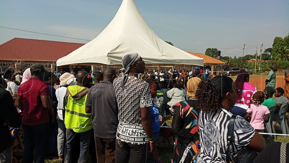 Residents of Nakwero A Cell, Kimwanyi Ward, in Kira Municipality, Wakiso District, wait for their names to be read during the LC I Chairperson elections. (Photo by Francis Emorut)
