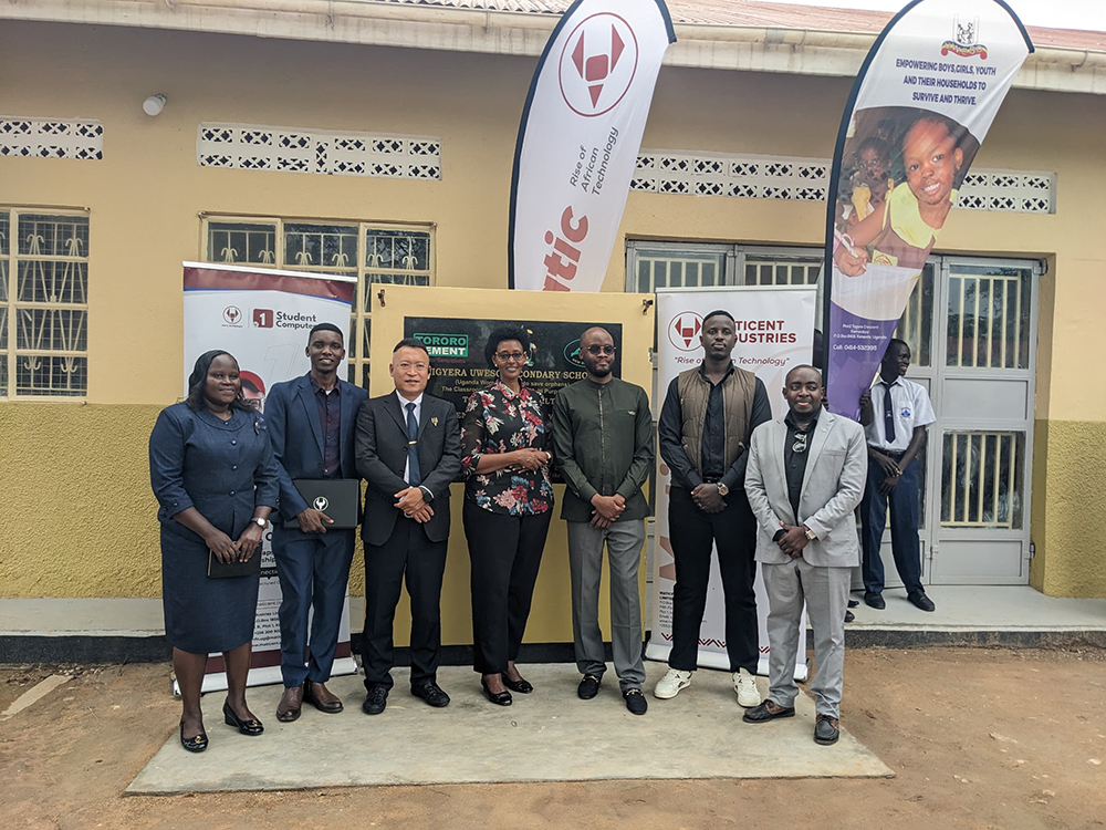 Jolly Kamugina Kamuhangire, CEO of the Uganda Women’s Effort to Save Orphans (centre, in floral top), hailed Maticent Industries for its generous support, noting that through the Bbala Initiative, UWESO is working to ensure that no child is left behind in the digital age. (Courtesy photo)