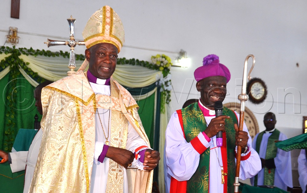 The Archbishop of the Province of Church of Uganda Most Rev. Dr. Samuel Stephen Kaziimba Mugalu with Bishop Tr. Rev. Charles Collins Andaku. (Credit: Robert Ariaka)